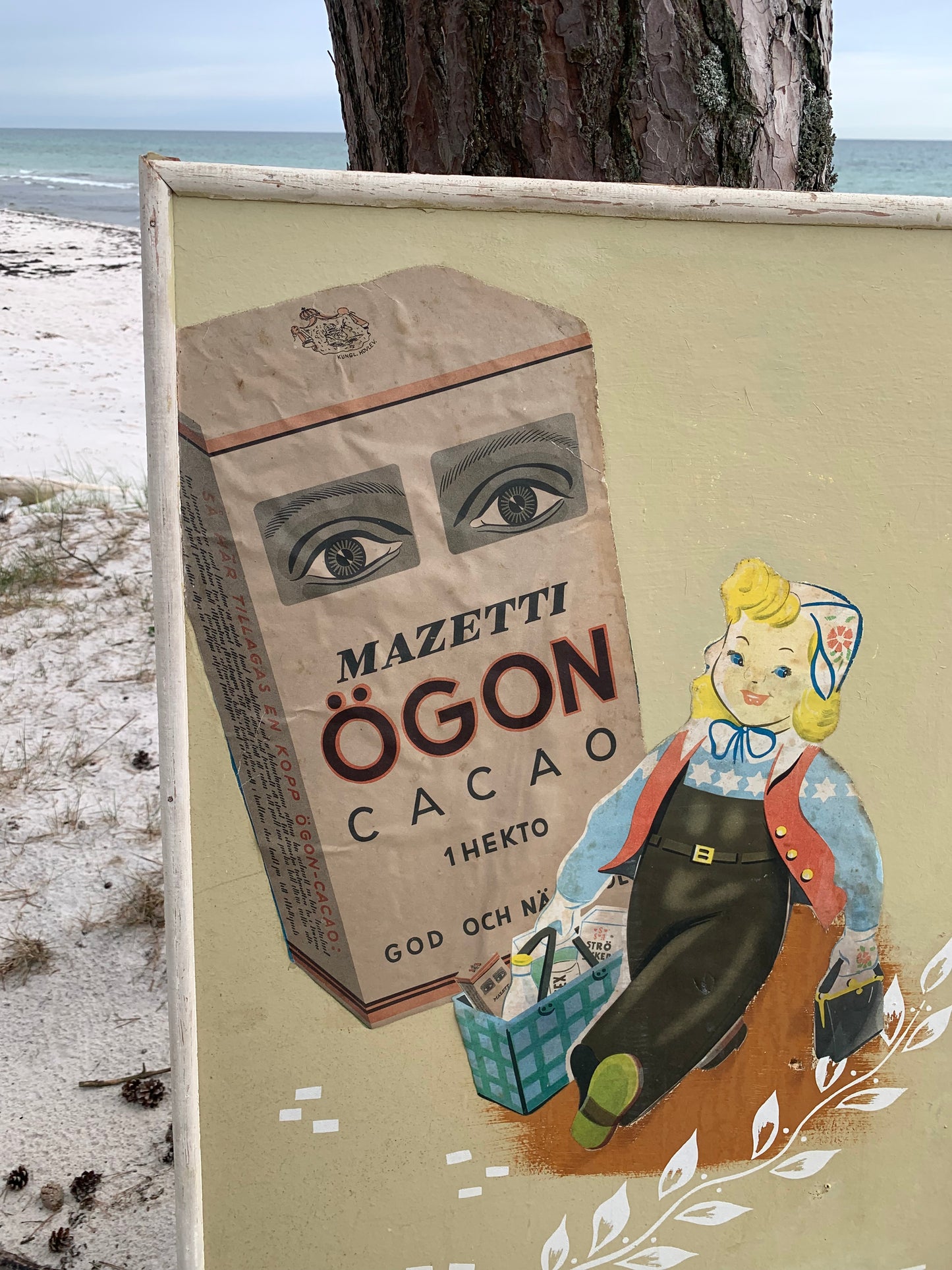 Gammelt Mazetti reklameskilt i træramme