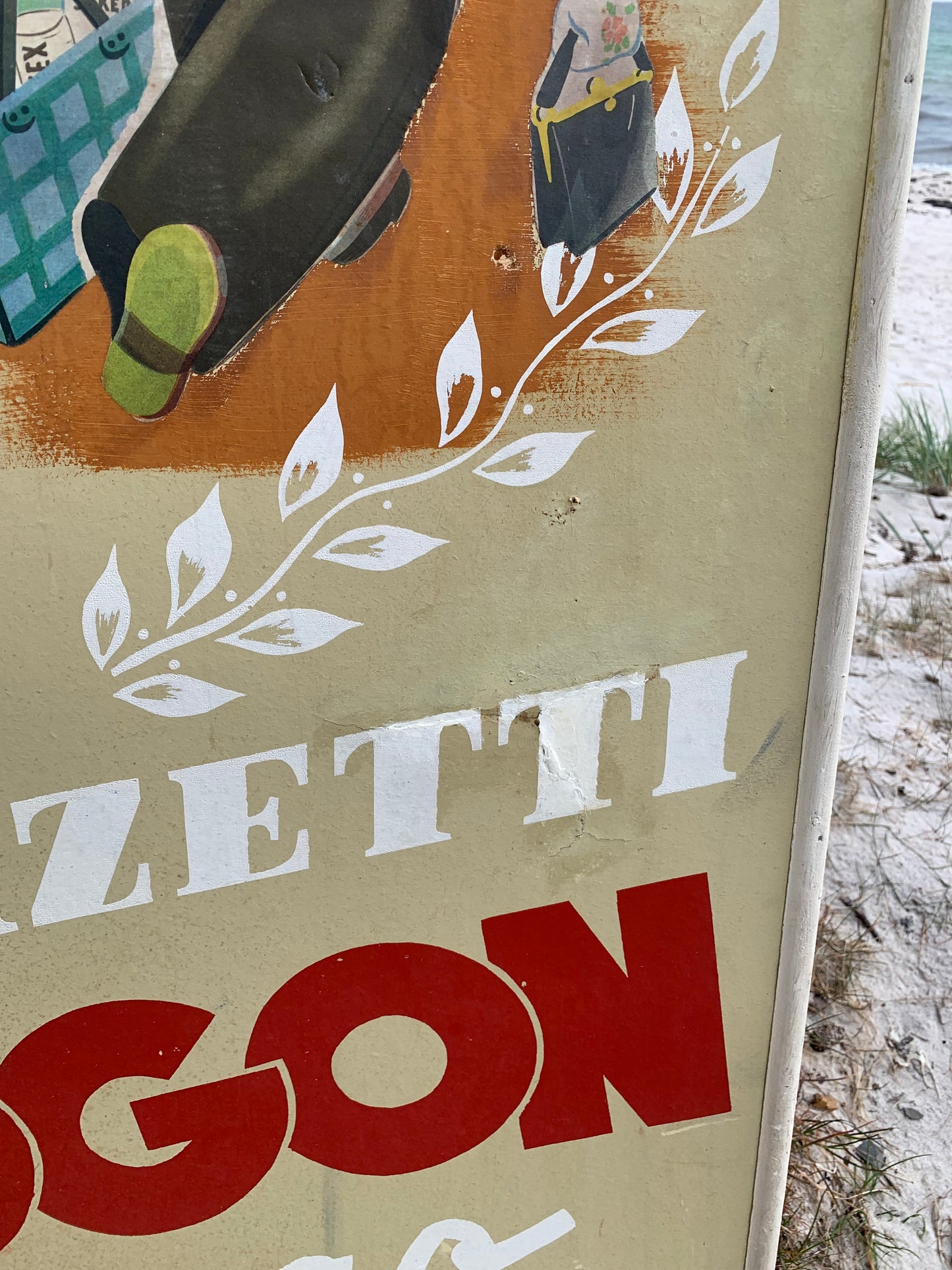 Gammelt Mazetti reklameskilt i træramme