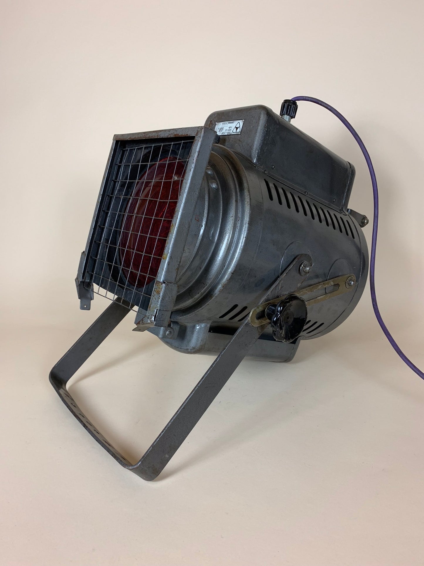 Projektør med rødt eller hvidt glas