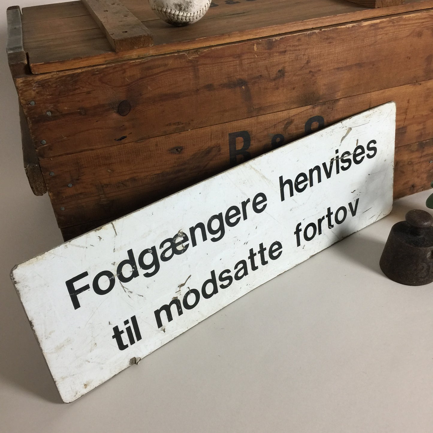 Skilt med venlig oplysning