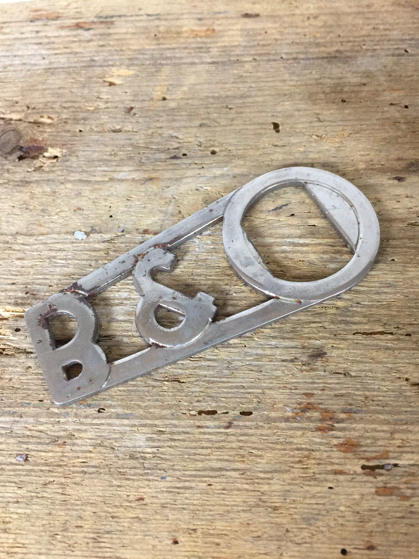 Reklameoplukker fra B&O med patina