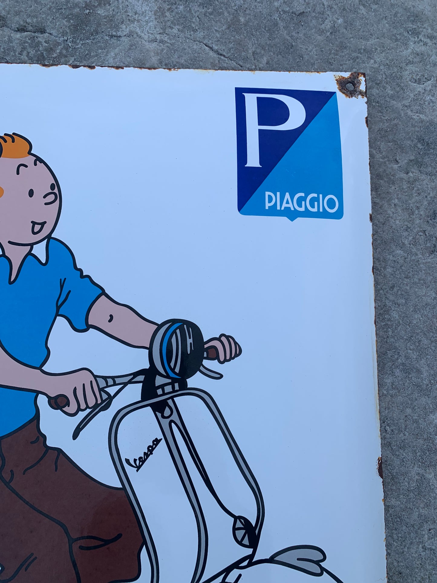Tintin og Vespa skilt