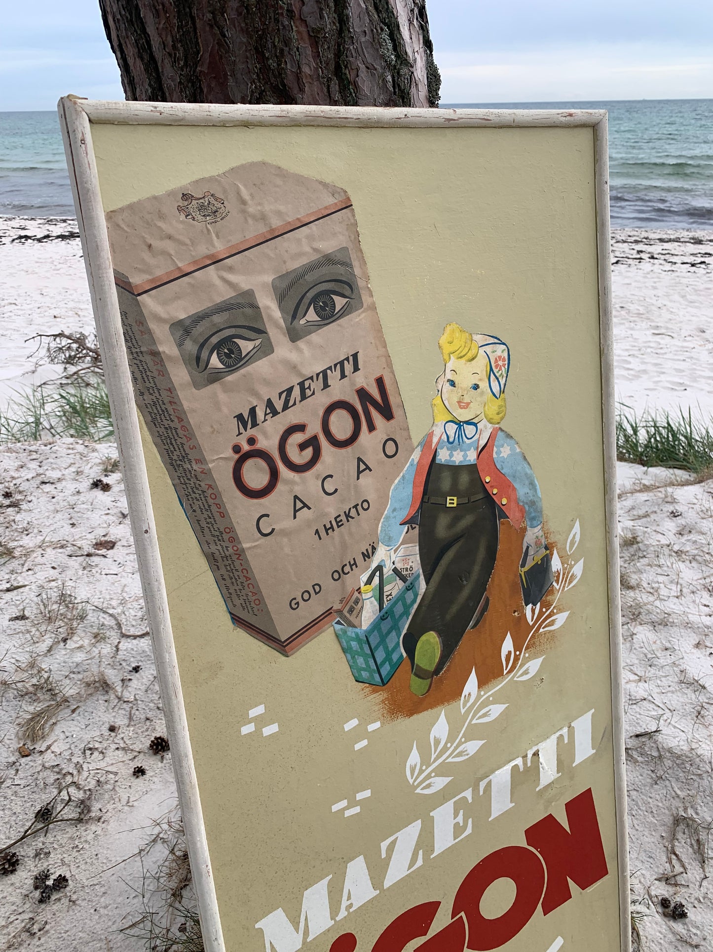 Gammelt Mazetti reklameskilt i træramme