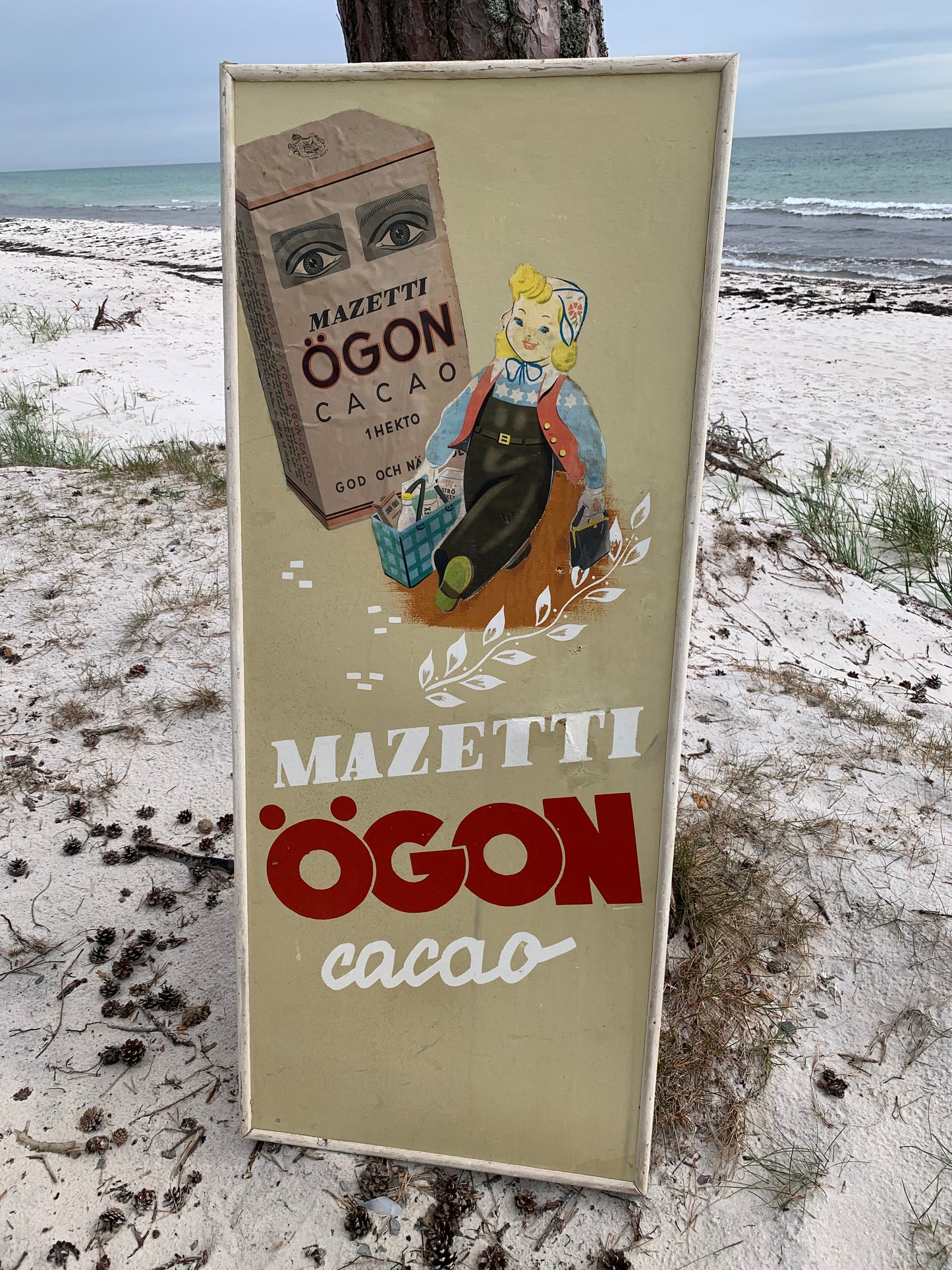 Gammelt Mazetti reklameskilt i træramme