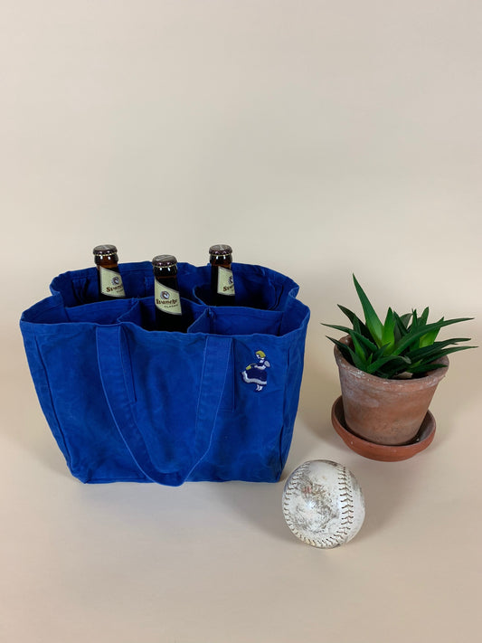 Stofpose med velkendt Irma motiv og rum til flasker
