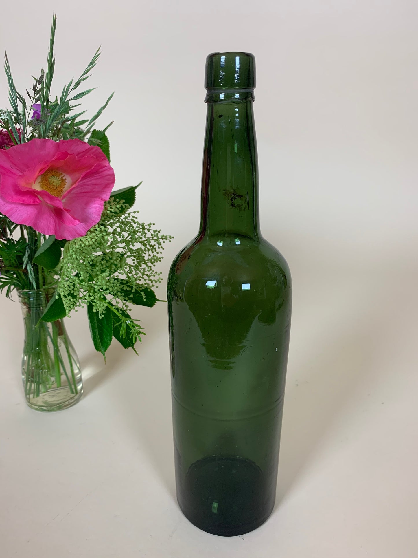 Dekorativ grøn flaske